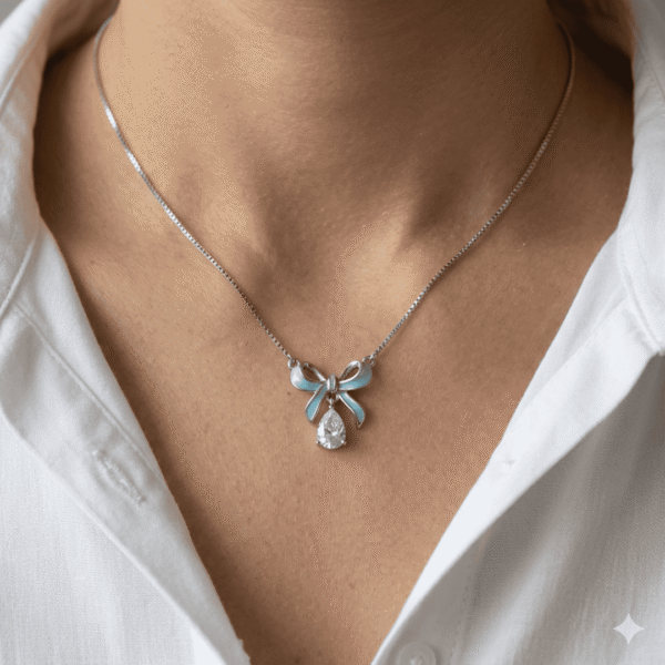 BOW WITH TEARDROP CHAIN PENDANT