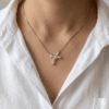 INFINITY CROSS CHAIN PENDANT