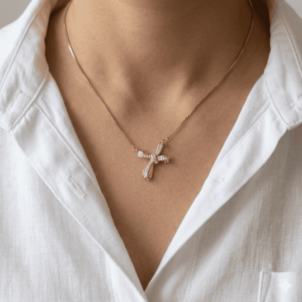 INFINITY CROSS CHAIN PENDANT