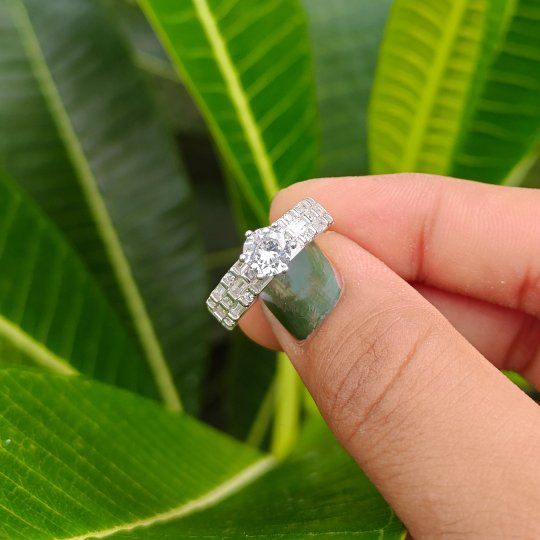 solitaire And Baguette Ring
